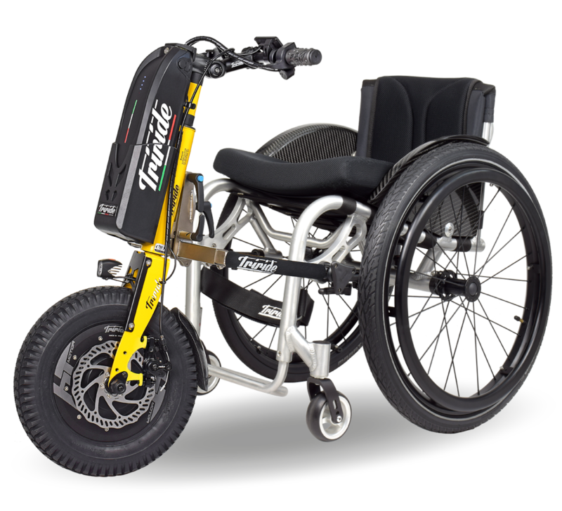 special compact all road triride yellow attached to wheelchair 