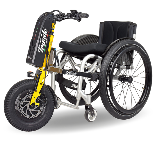 special compact all road triride yellow attached to wheelchair 