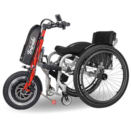 Manual wheelchair with a Triride l14 attached on a white background