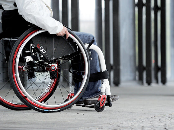 Progeo folding wheelchair lightweight ego white red side