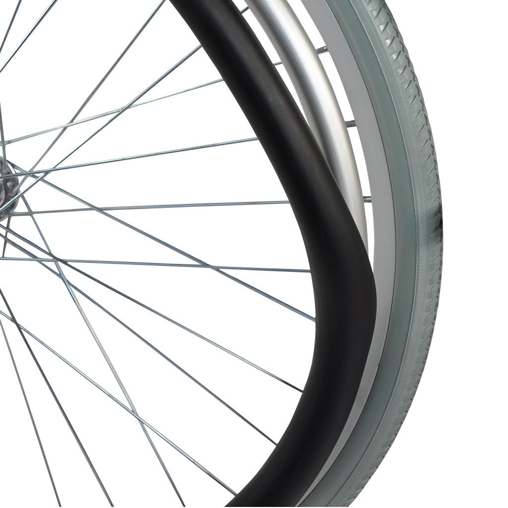 Close-up of a black rubber wheelchair push rim cover fitted over a wheelchair push rim.