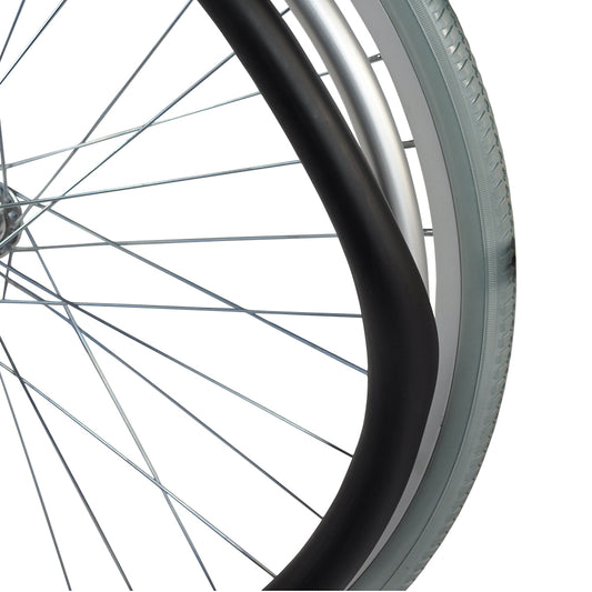 Close-up of a black rubber wheelchair push rim cover fitted over a wheelchair push rim.